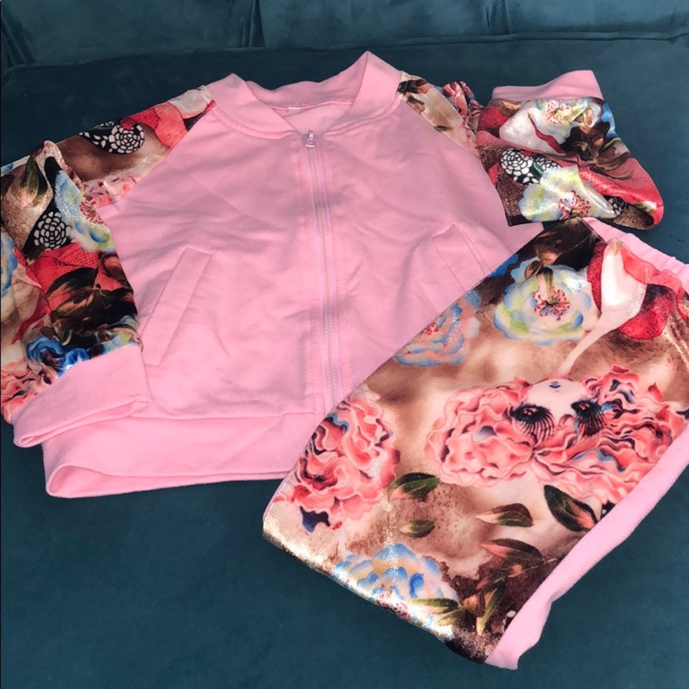 Pink and floral sweatsuit.